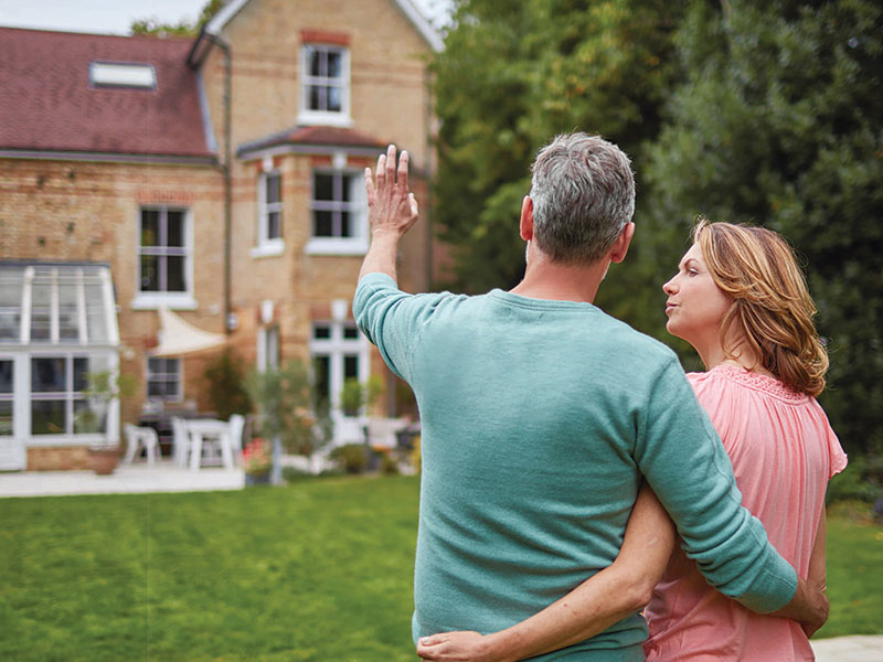 Couple looking at their roof