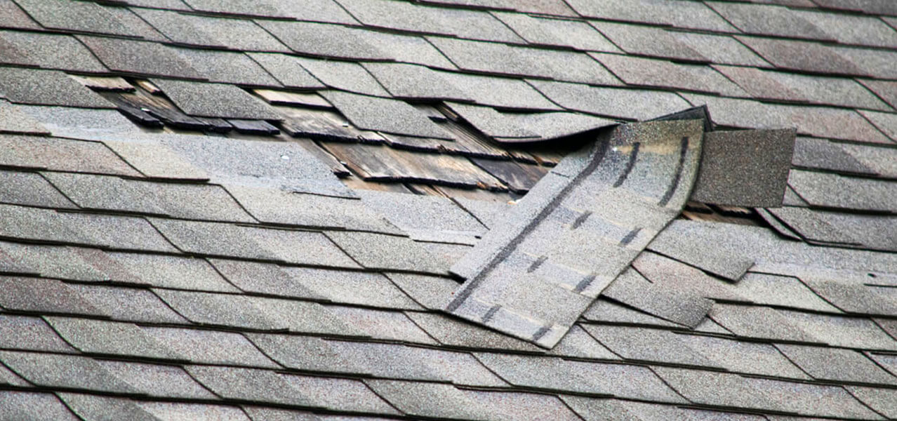 Shingles sliding down roof in need of a repair