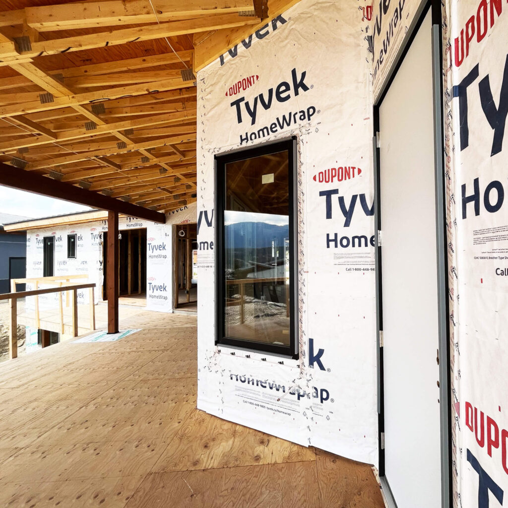 Tyvek siding protection on walls outside home on porch