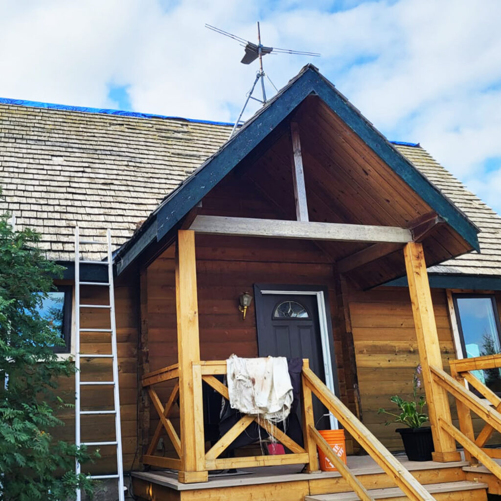Cedar shake to metal roof transformation in Calgary Alberta