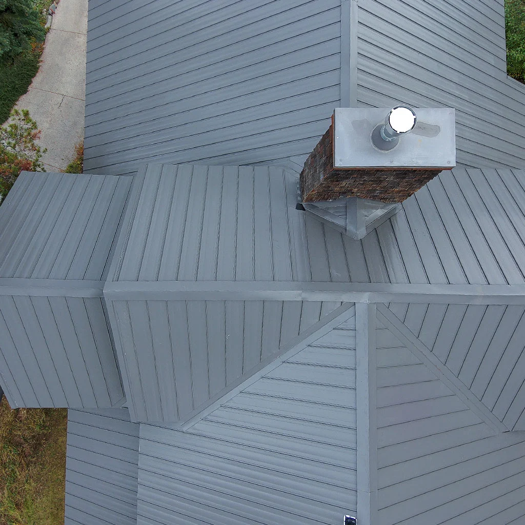 Standing seam metal roof installation example for luxury homes in Upper Mount Royal Calgary