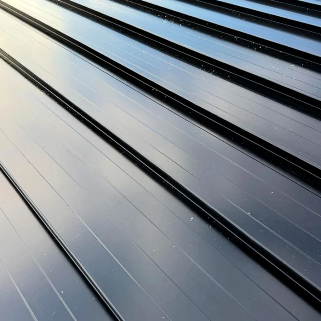 Standing seam metal roof installation example for luxury homes in Elbow Park Calgary