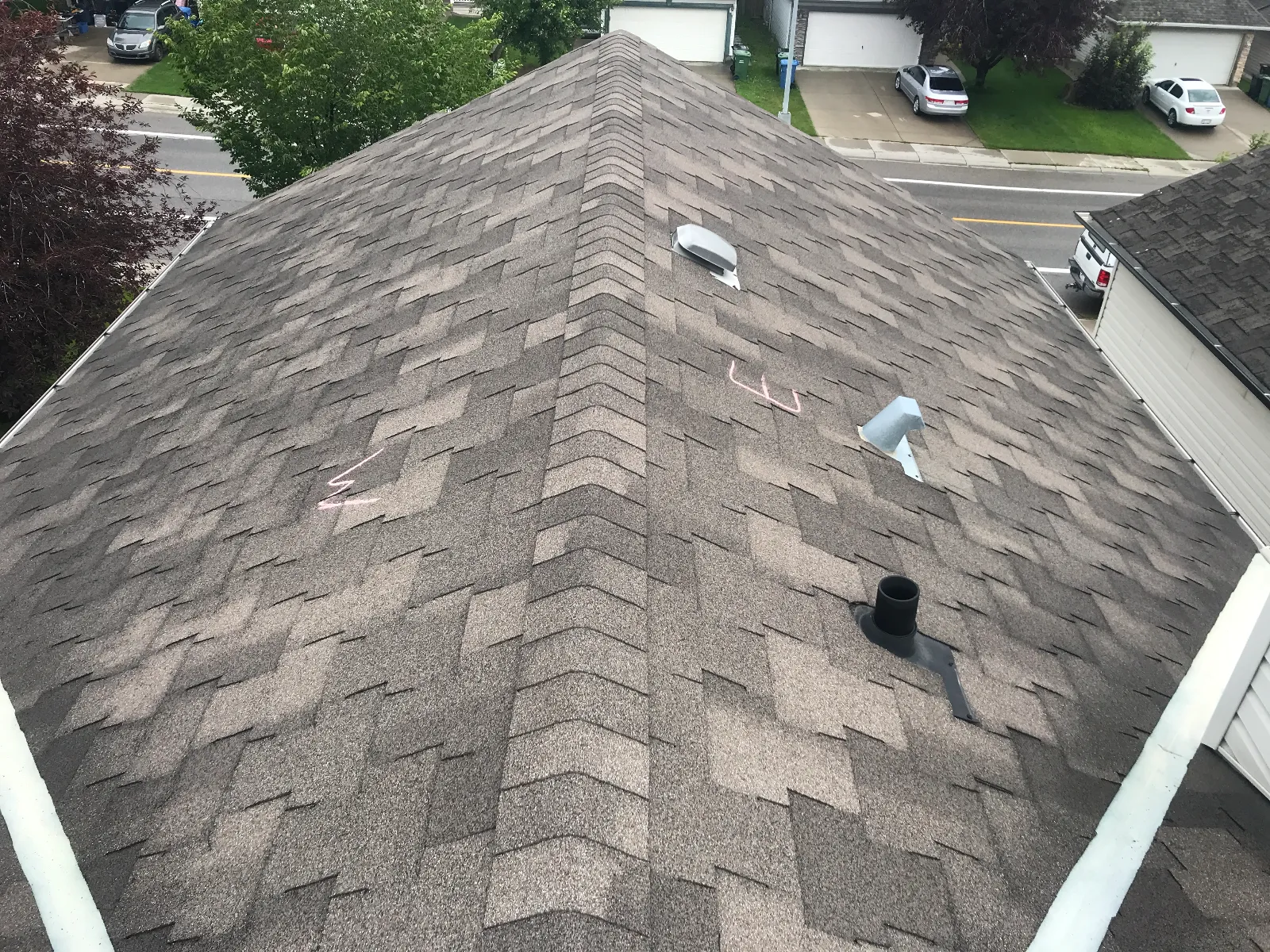 Architectural shingle roof with hips, box vents and a plumbing vent
