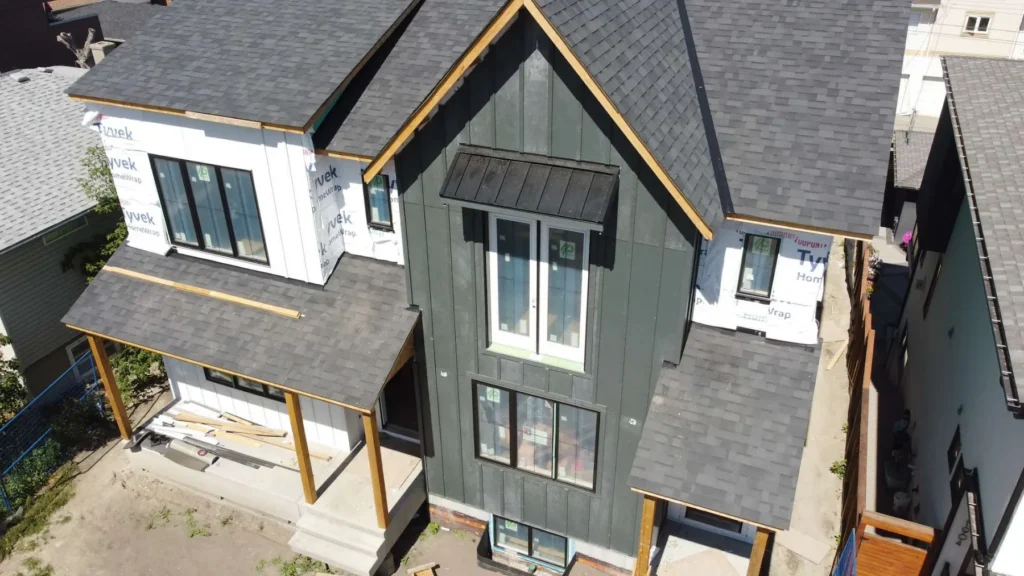 New shingle roof with valleys around a gable dormer on an infill in the Marda Loop and Altadore area of Calgary