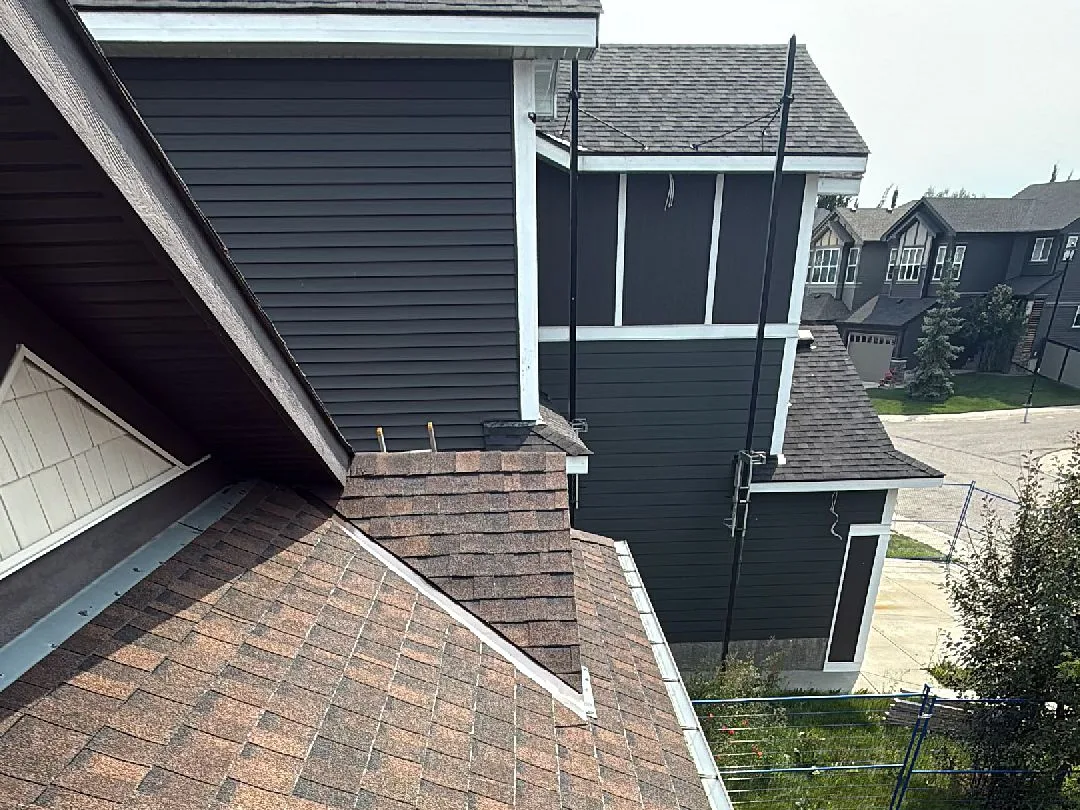 Lower roofline of a two-storey home during a roof inspection