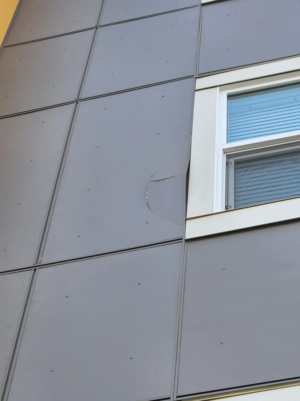 A siding panel on the condo, Calgary, AB