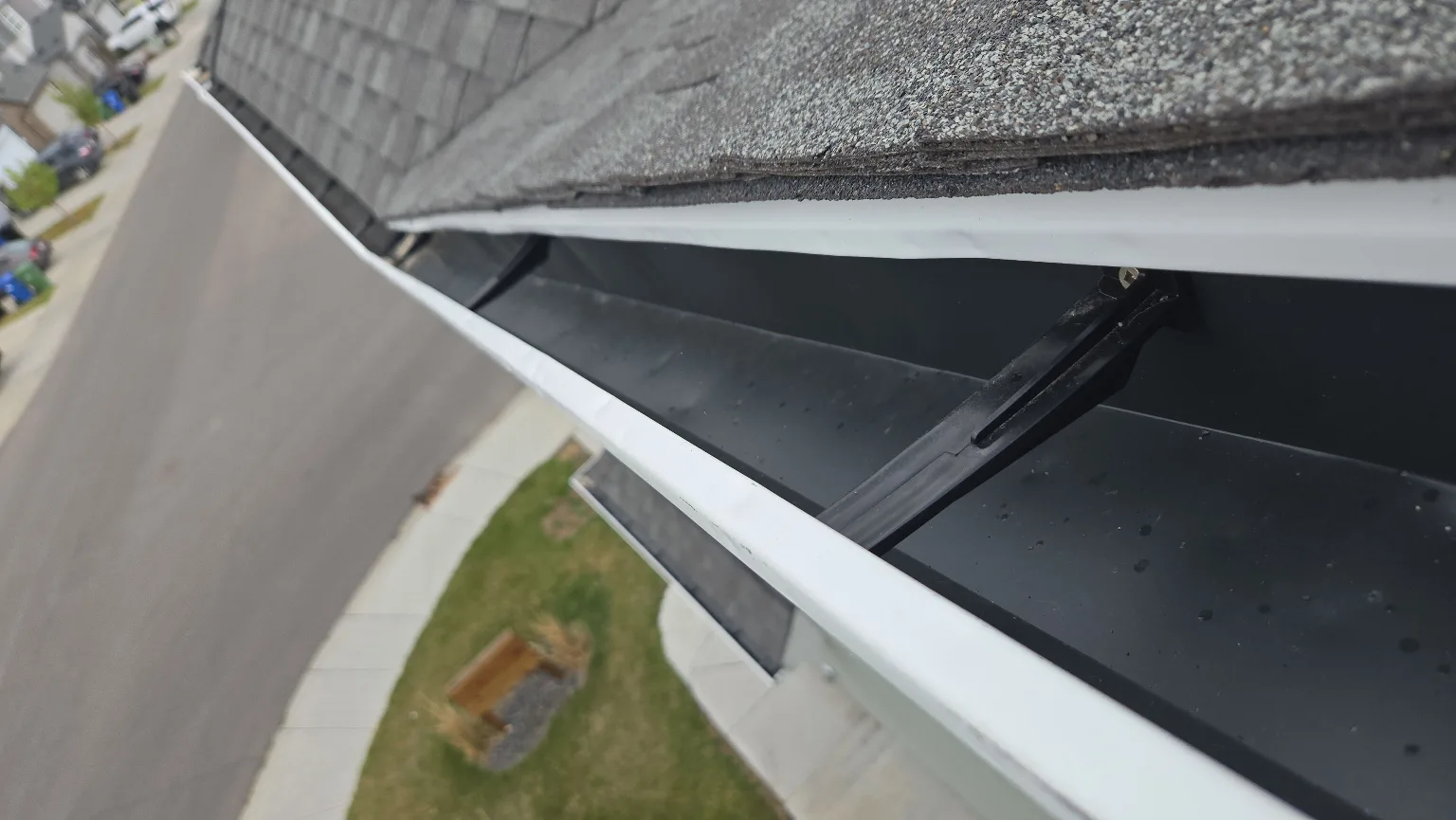 Eavestrough and fascia at the roof edge, Calgary