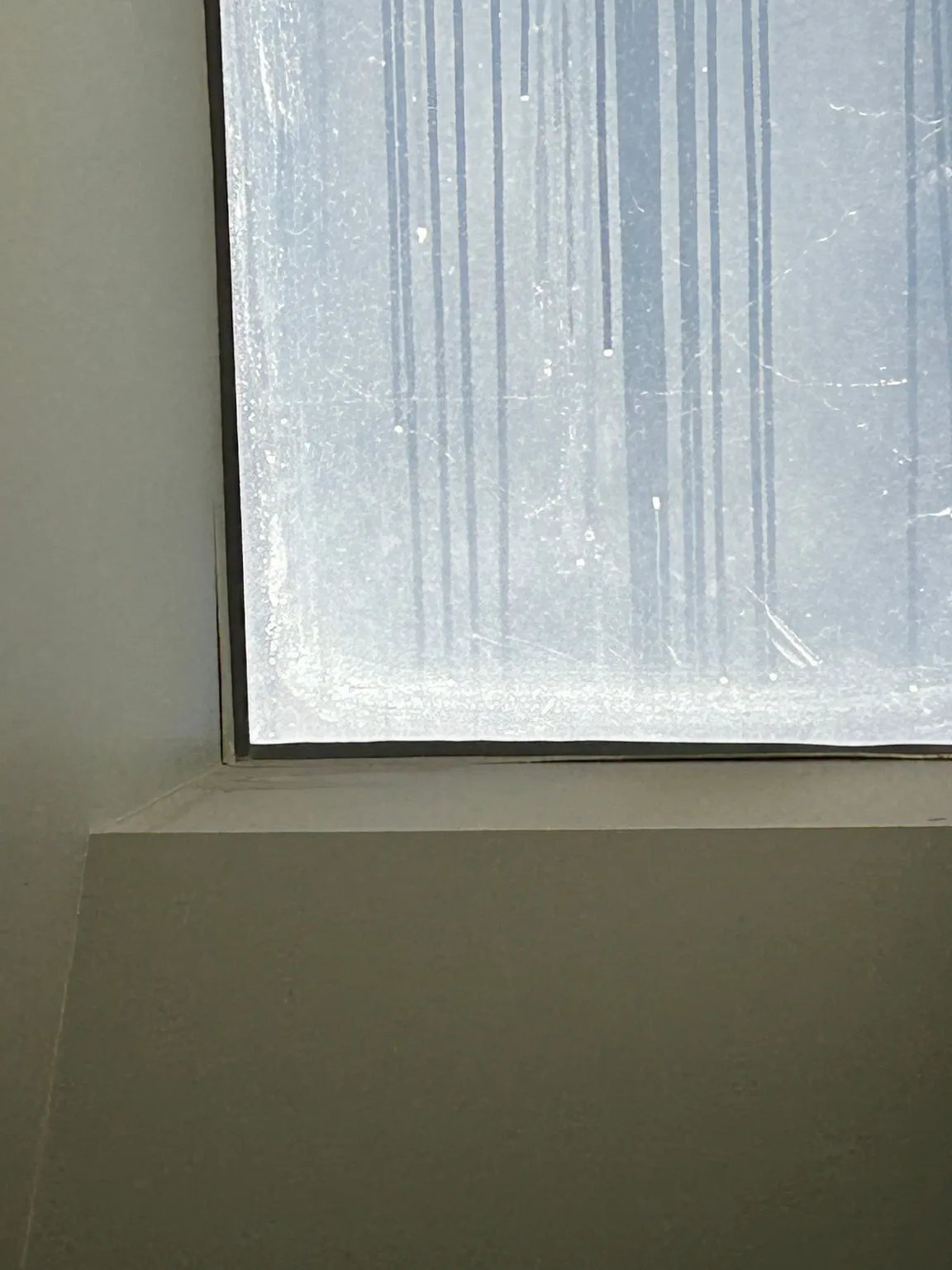 A hail-damaged skylight seen from inside, Calgary