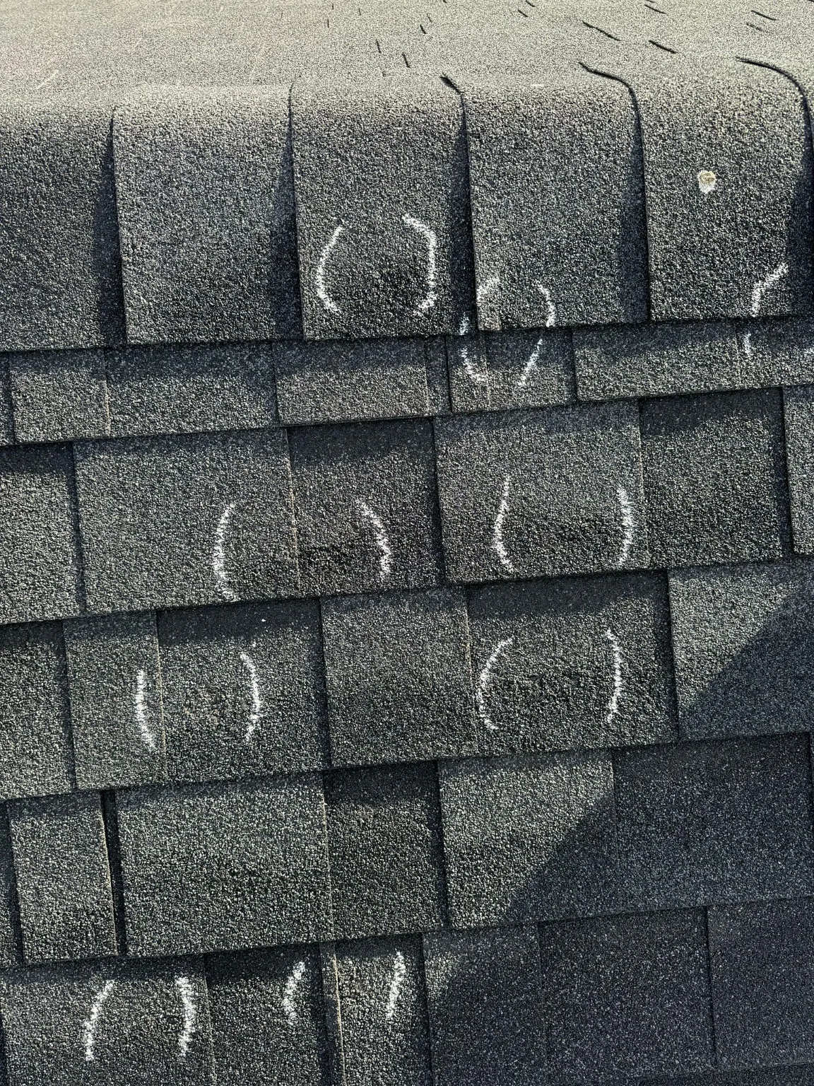 Hail hits across a shingle slope, Calgary