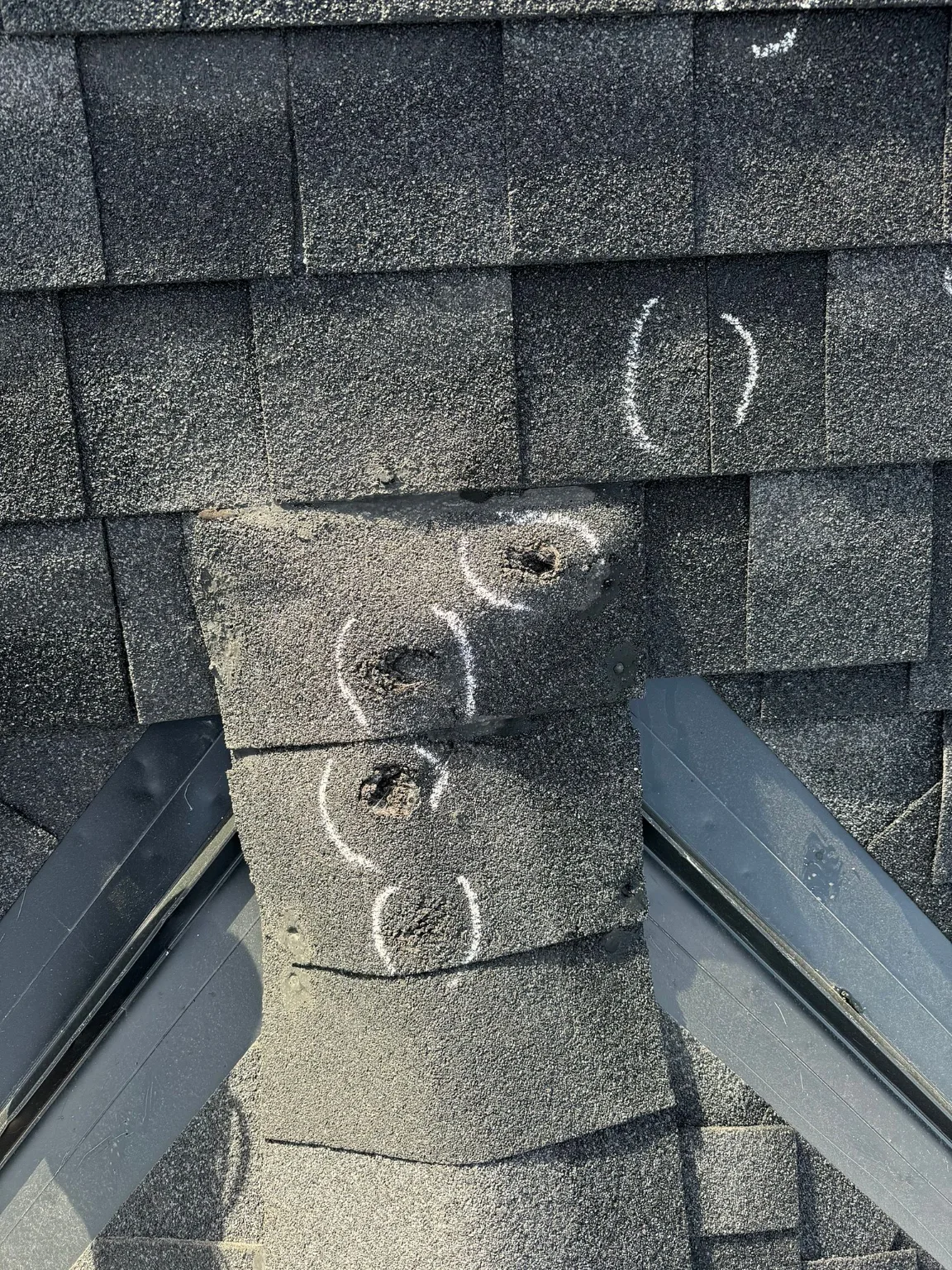 Hail damage on a ridge cap, Calgary