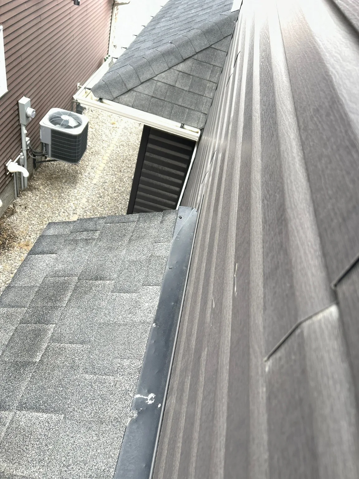 Roof-to-wall flashing checked after hail, Calgary