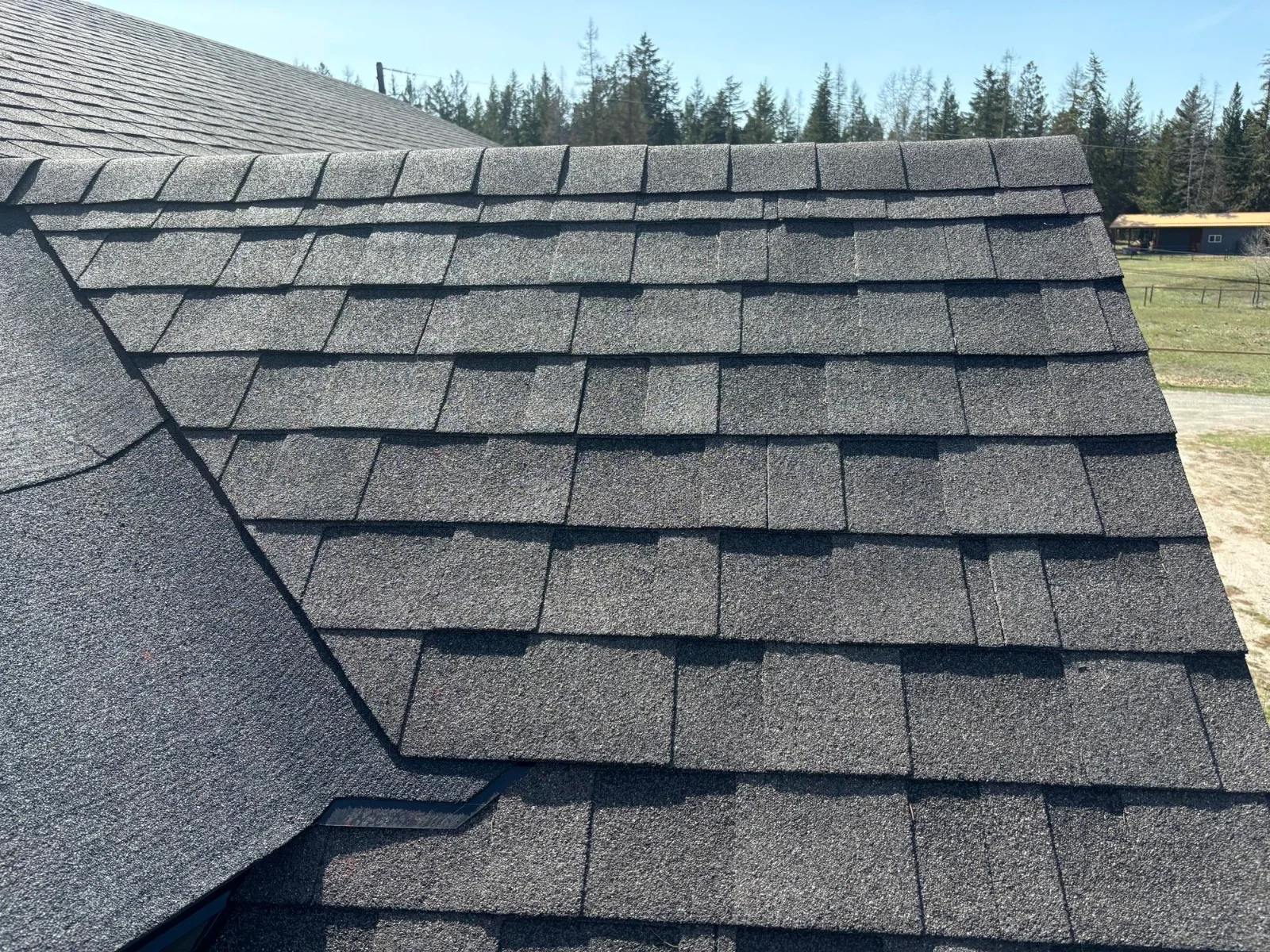 A repaired roof with a new open valley, Cranbrook, BC