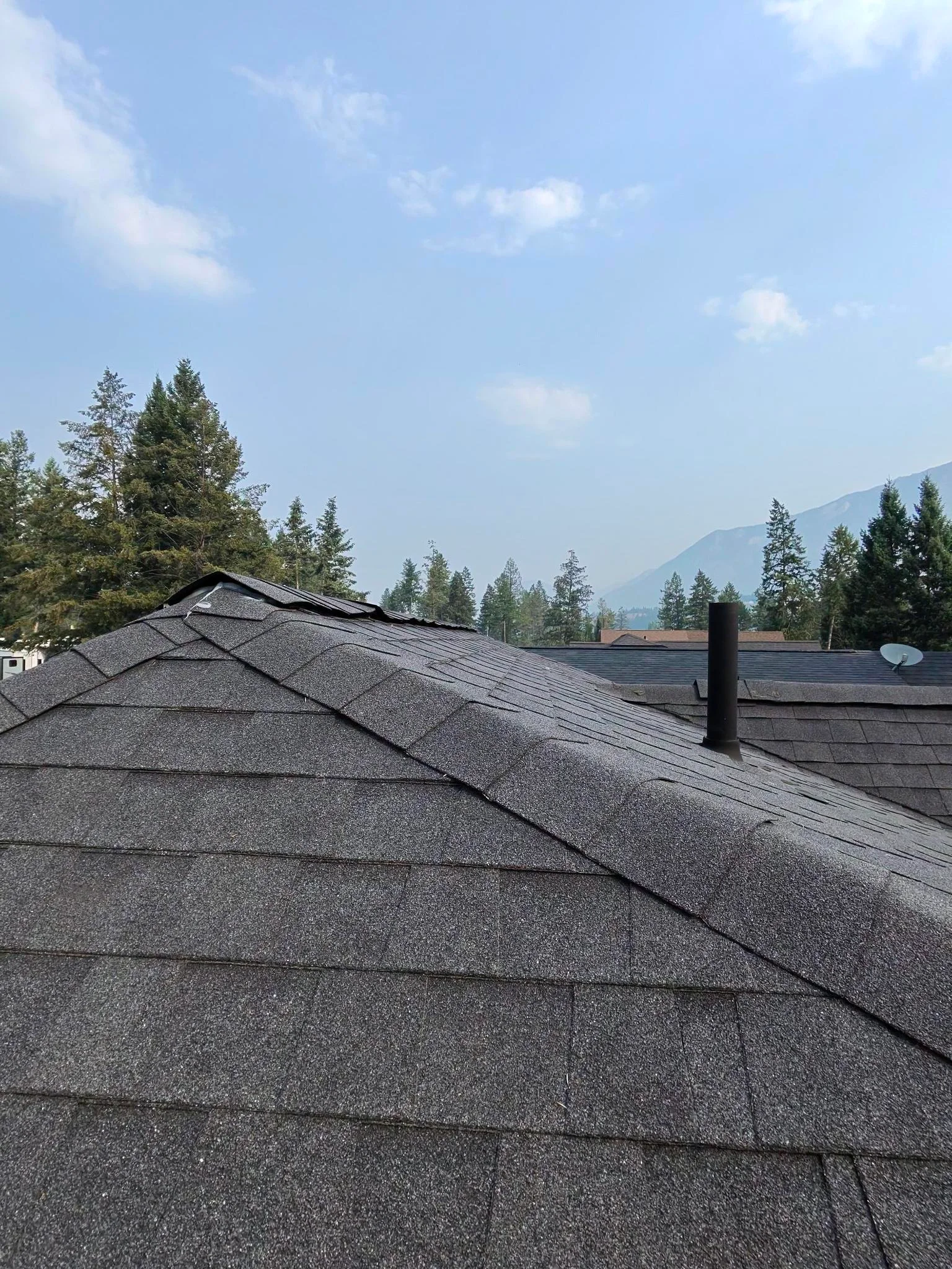 The ridge and slopes showing granule loss, Edgewater, BC