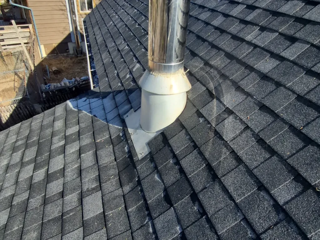 New flashing around a vent pipe on an Edgewater roof