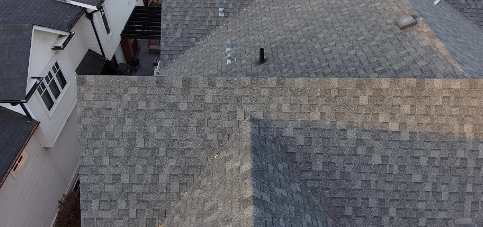 Overhead view of the upper roof and wall flashing, Elbow Park, Calgary, AB
