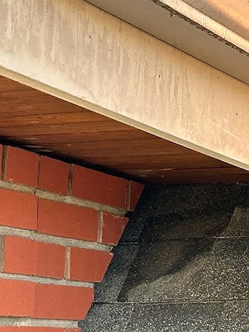 Where the roof meets a brick wall, Elbow Park, Calgary, AB