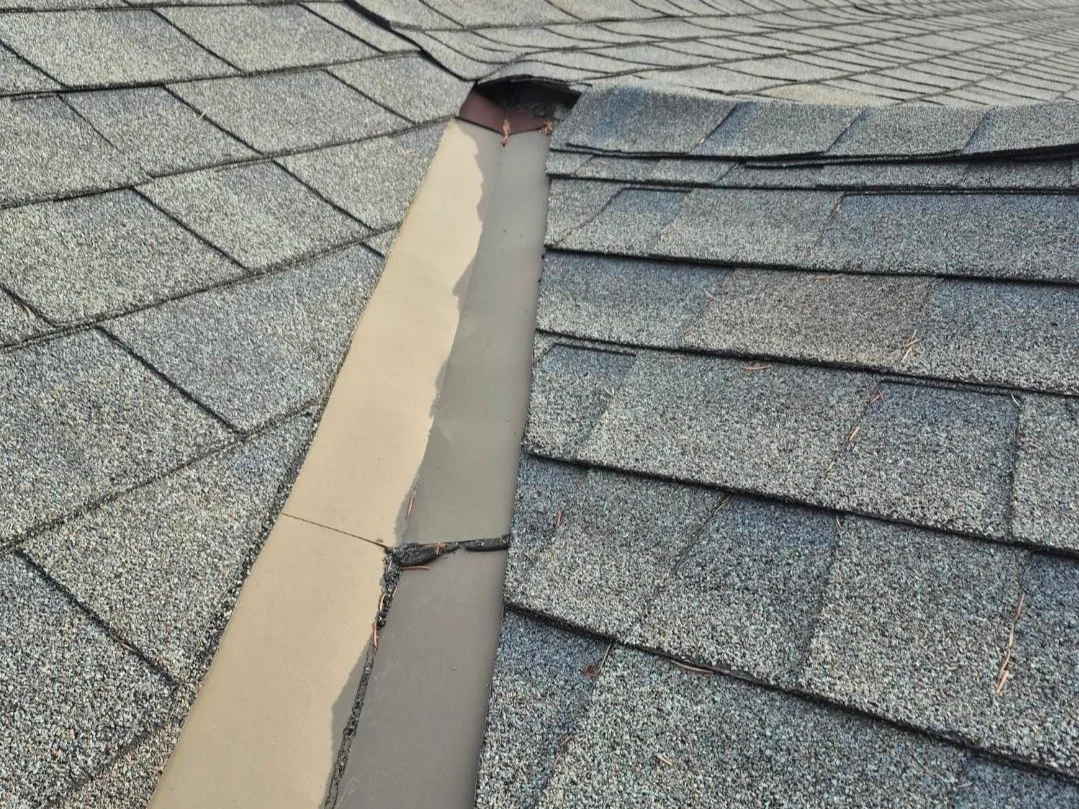 A roof valley assessed for a tune-up, Fairmont Hot Springs, BC