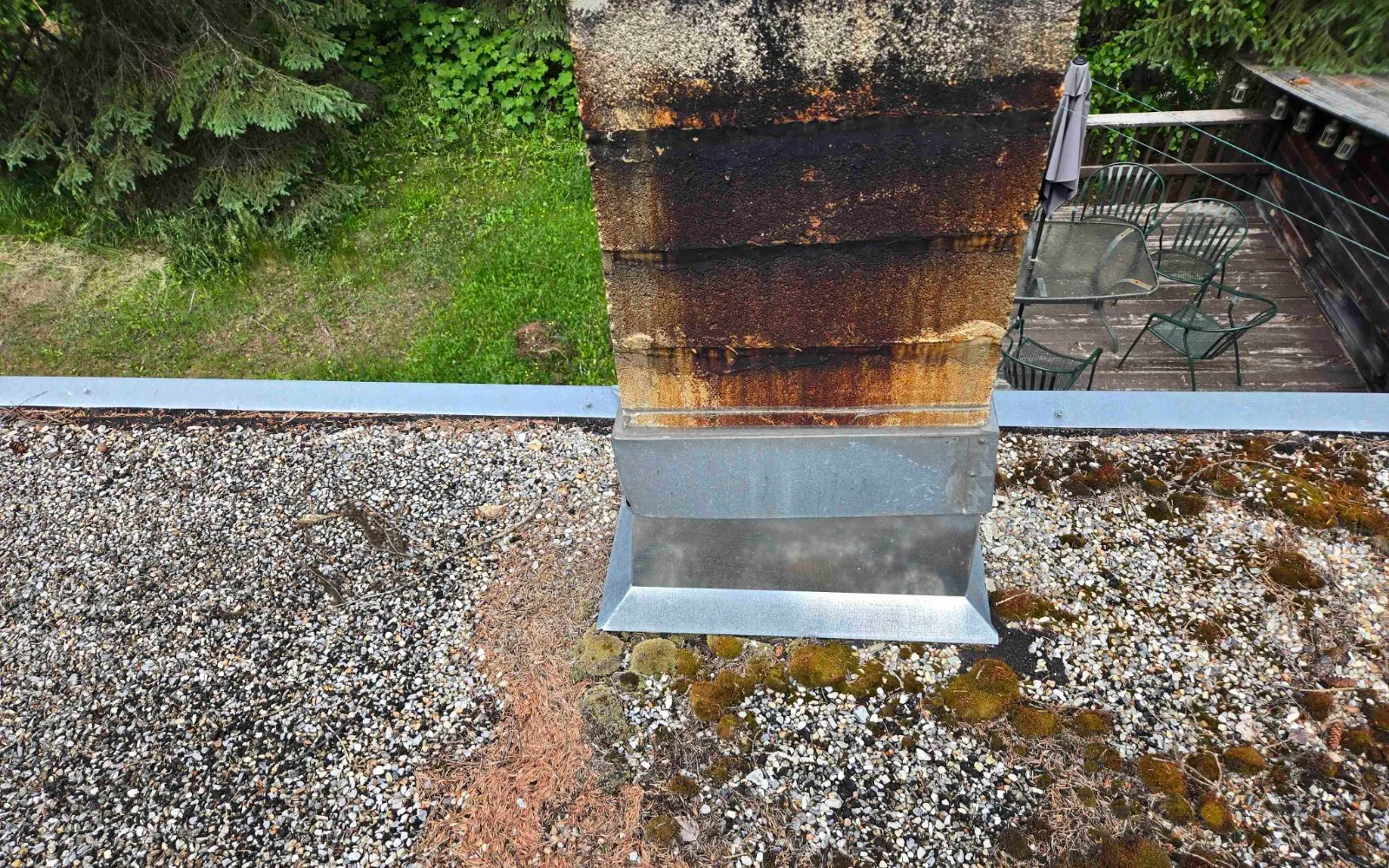 Rusted flashing on the old flat roof, Golden, BC