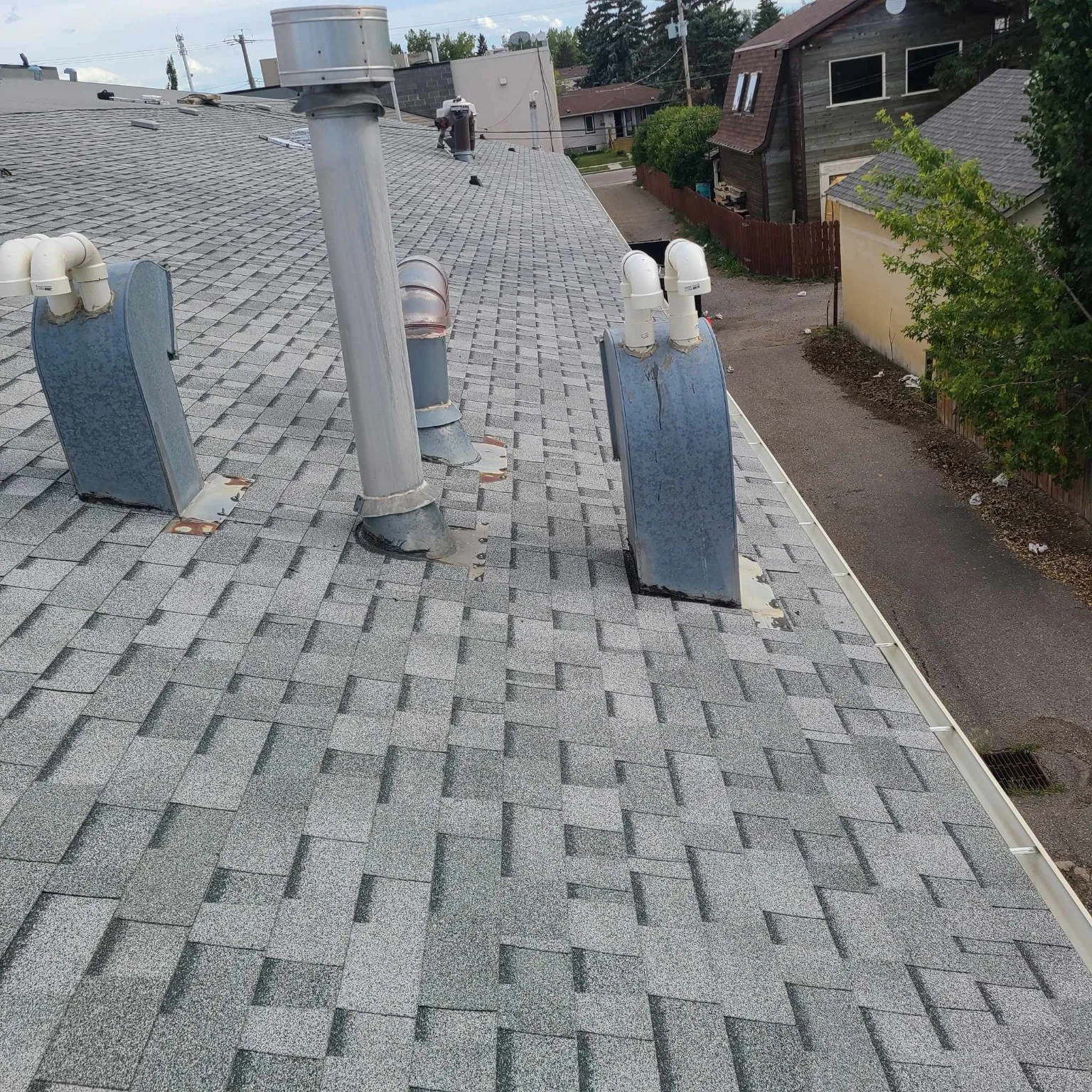 New roof vents on a commercial sloped roof, High River