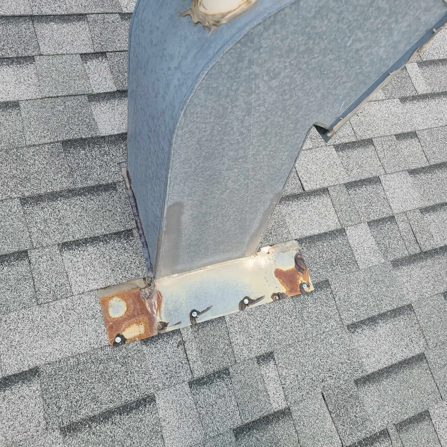 An old roof vent before replacement on a commercial building, High River