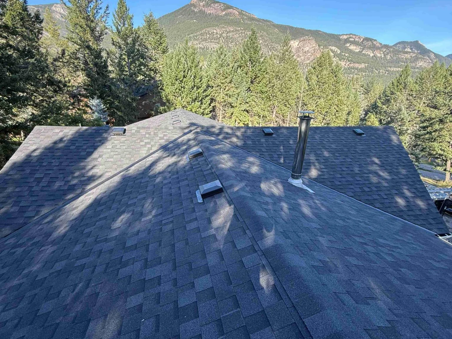 New IKO Cambridge shingles with the mountains beyond, Invermere, BC