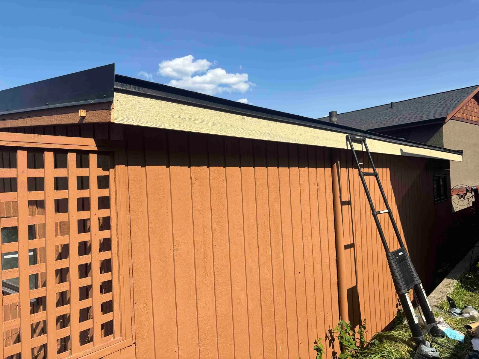New roof edge and flashings on the low-slope roof, Invermere, BC