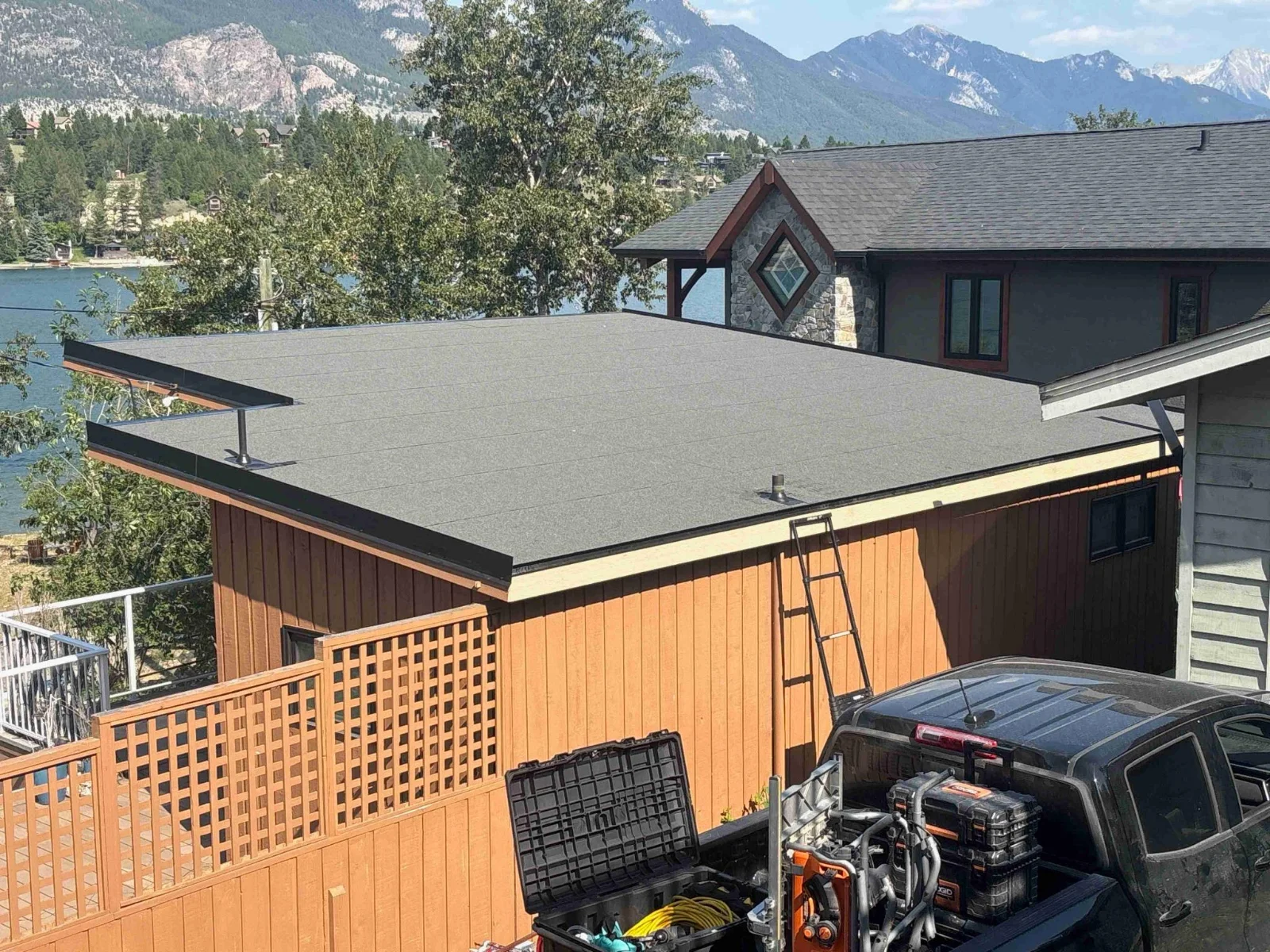 The new low-slope roof with the mountains behind, Invermere, BC