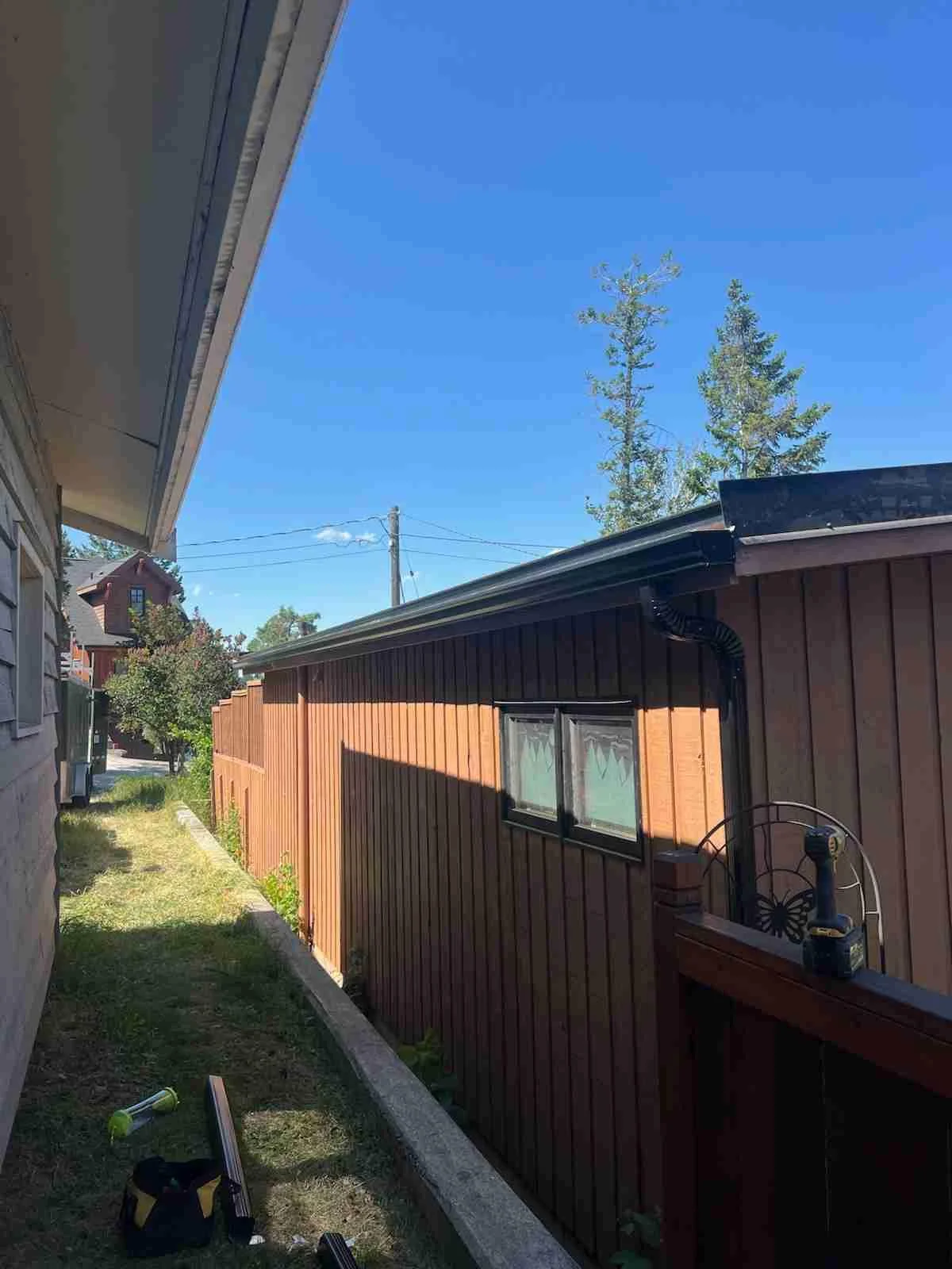 The side of the building with its new roof edge, Invermere, BC