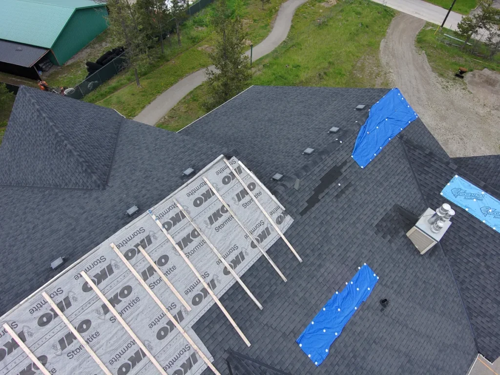 Ice and water membrane going down during a Radium Hot Springs re-roof