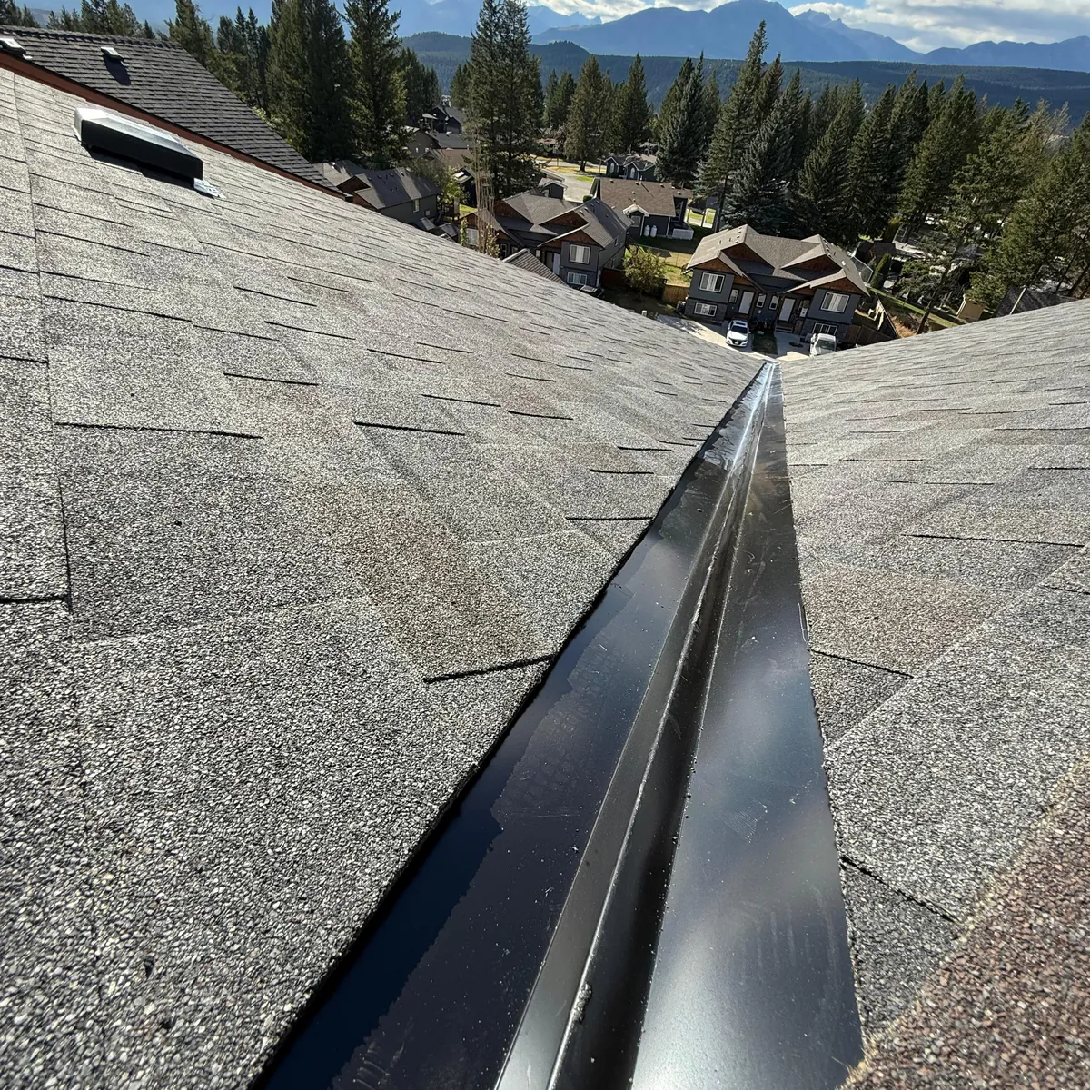 New metal valley flashing on a Radium Hot Springs roof