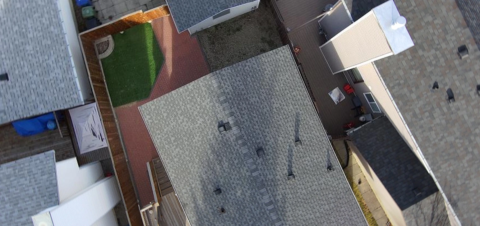 Overhead view of a detached garage roof before replacement, Riverbend, Calgary, AB