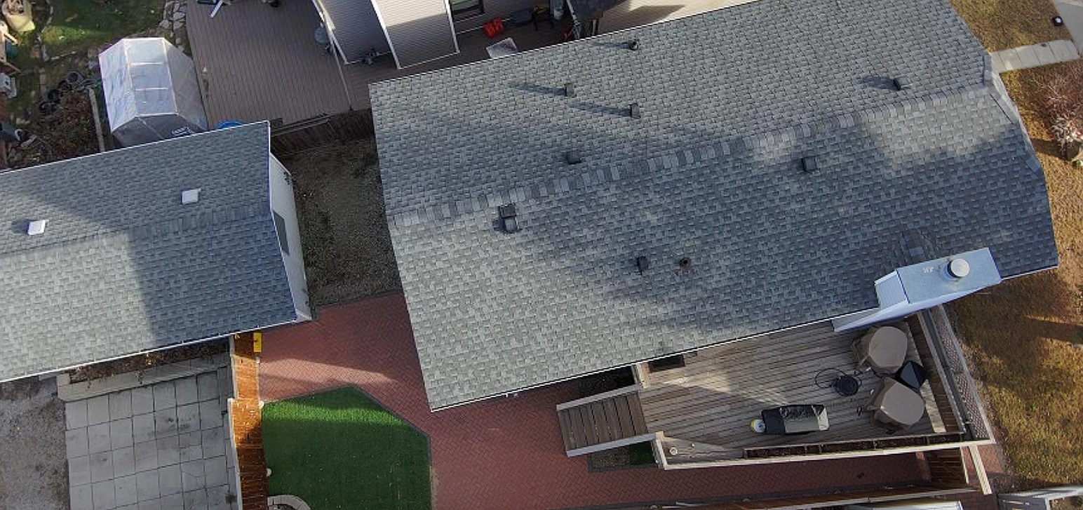 Overhead view of a house roof before replacement, Riverbend, Calgary, AB