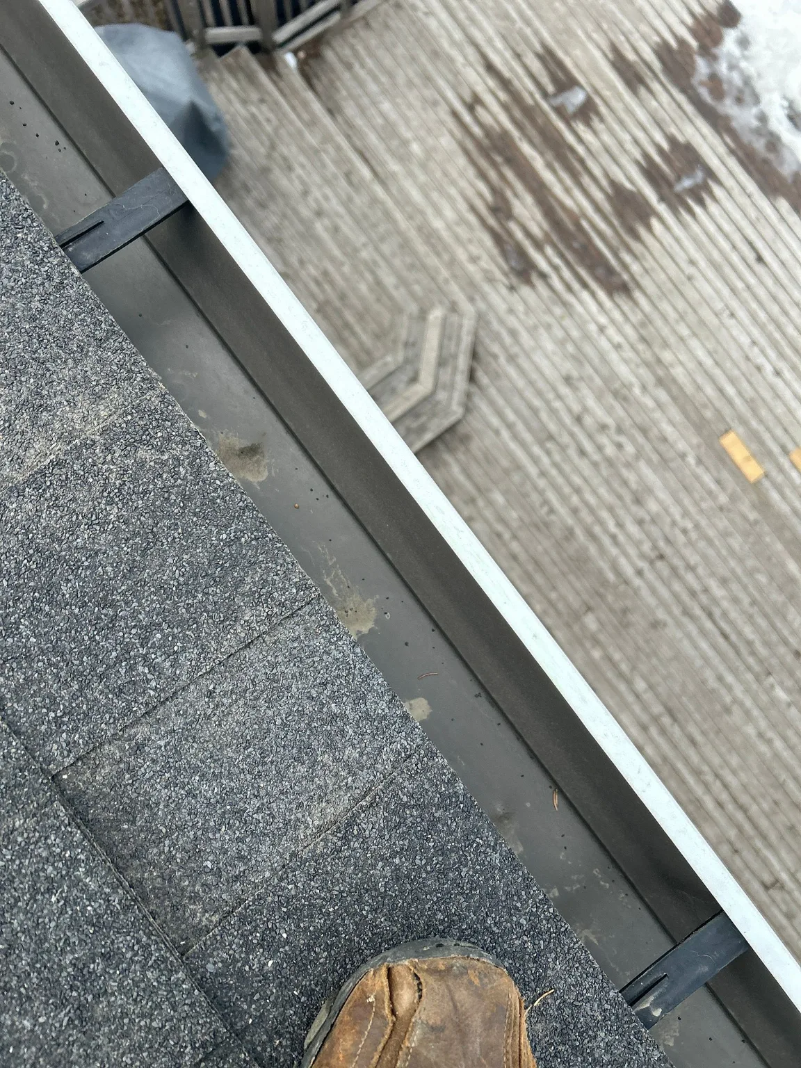 Eavestrough at the roof edge, southwest Calgary