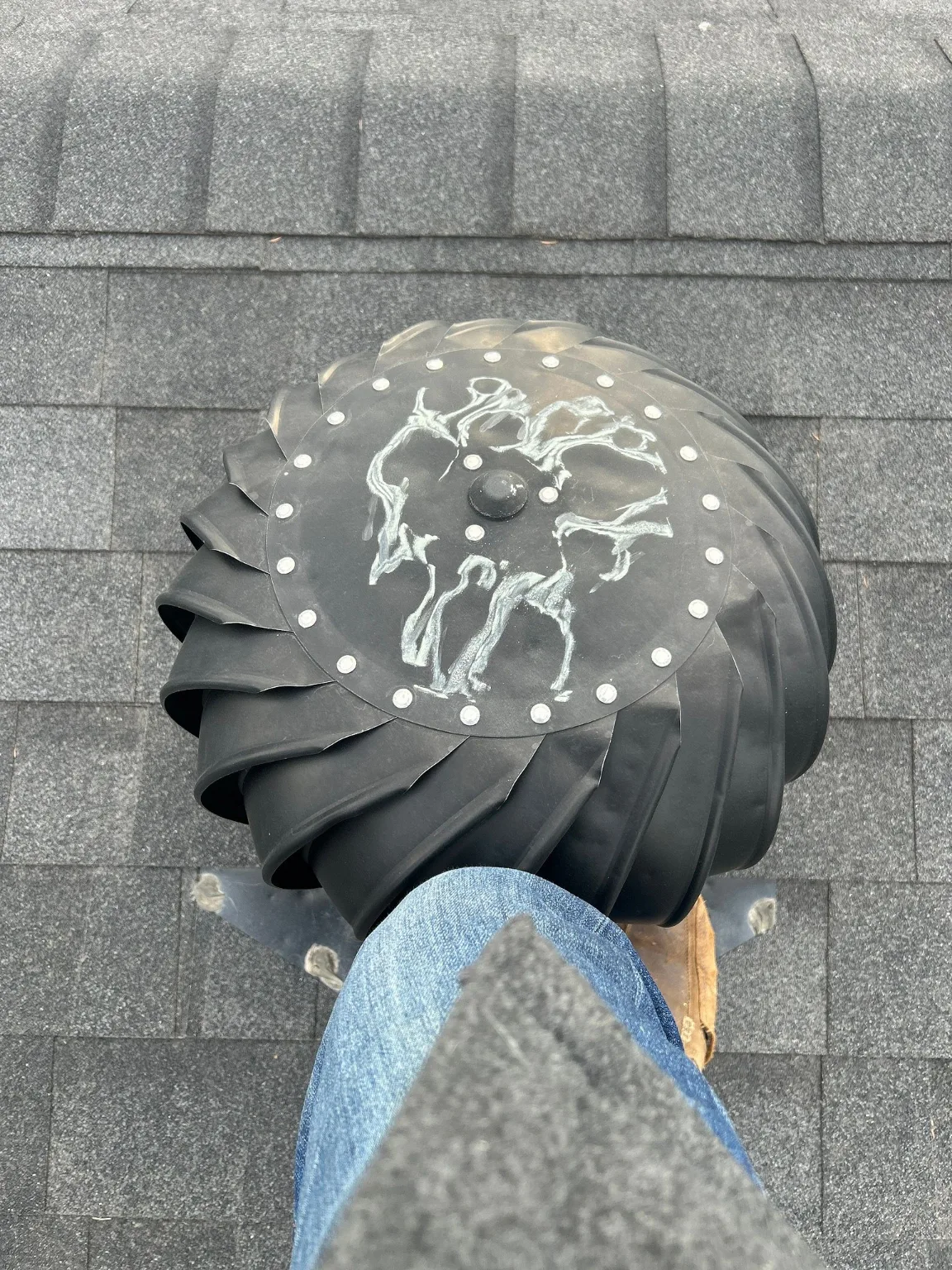 A turbine roof vent checked during an exterior assessment, Calgary
