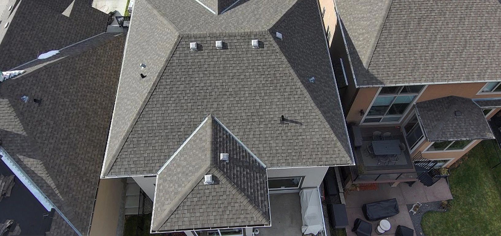 Overhead view of the rear roof slopes, Tuscany, Calgary, AB