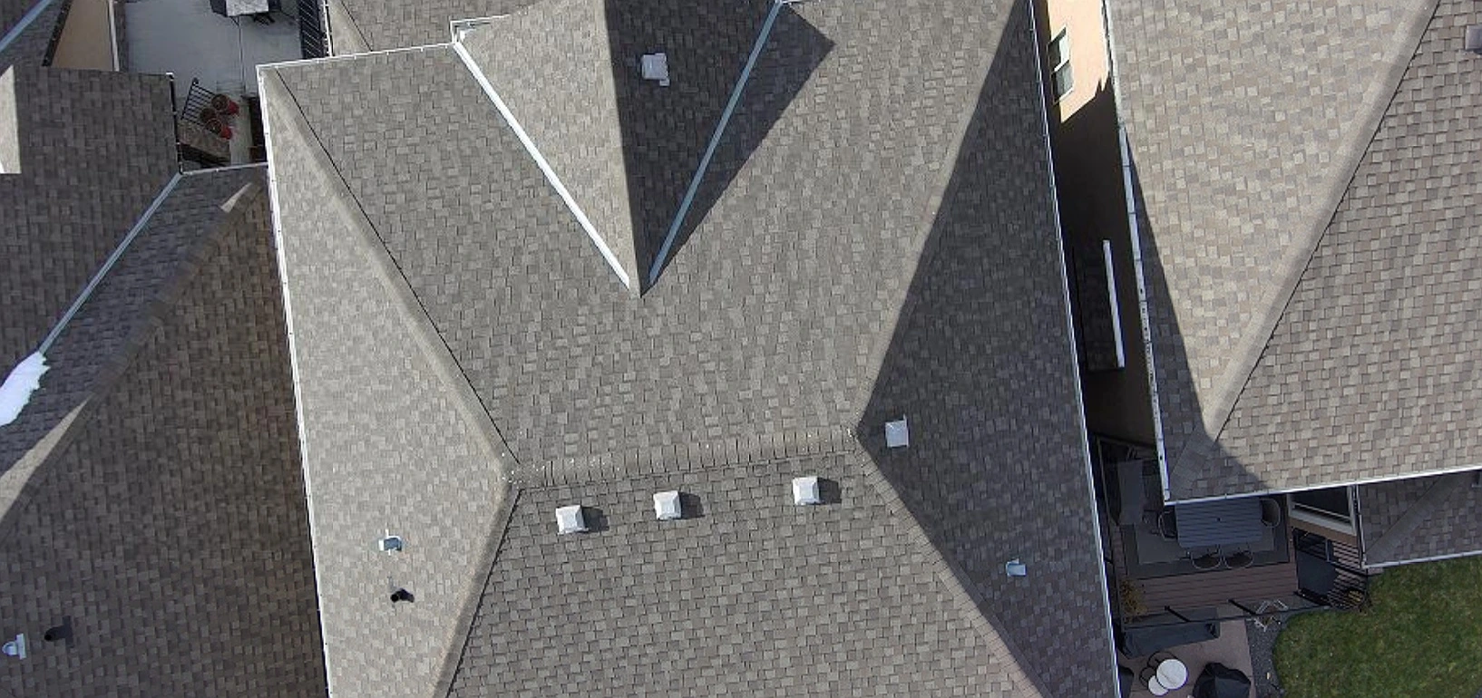 Overhead view of roof valleys and vents, Tuscany, Calgary, AB